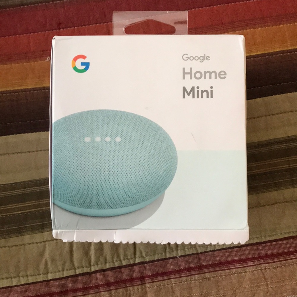 NEVER USED (only opened) aqua google home mini